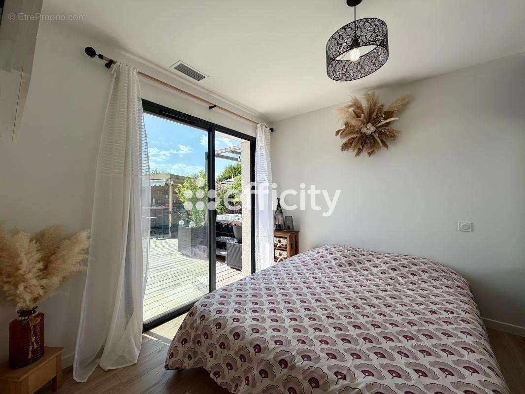 Maison 112 m² à Lanton  - photo 11