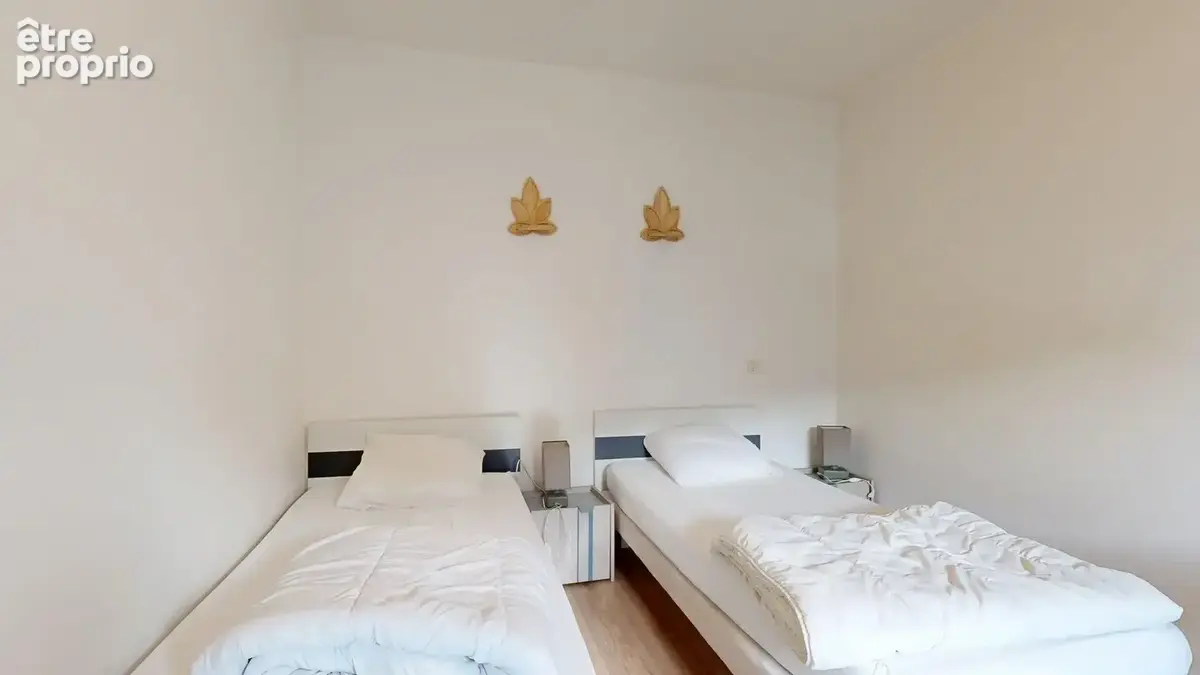 Charmant Appartement T3 Lumineux en Centre-Ville avec 2 Chambres - photo 12
