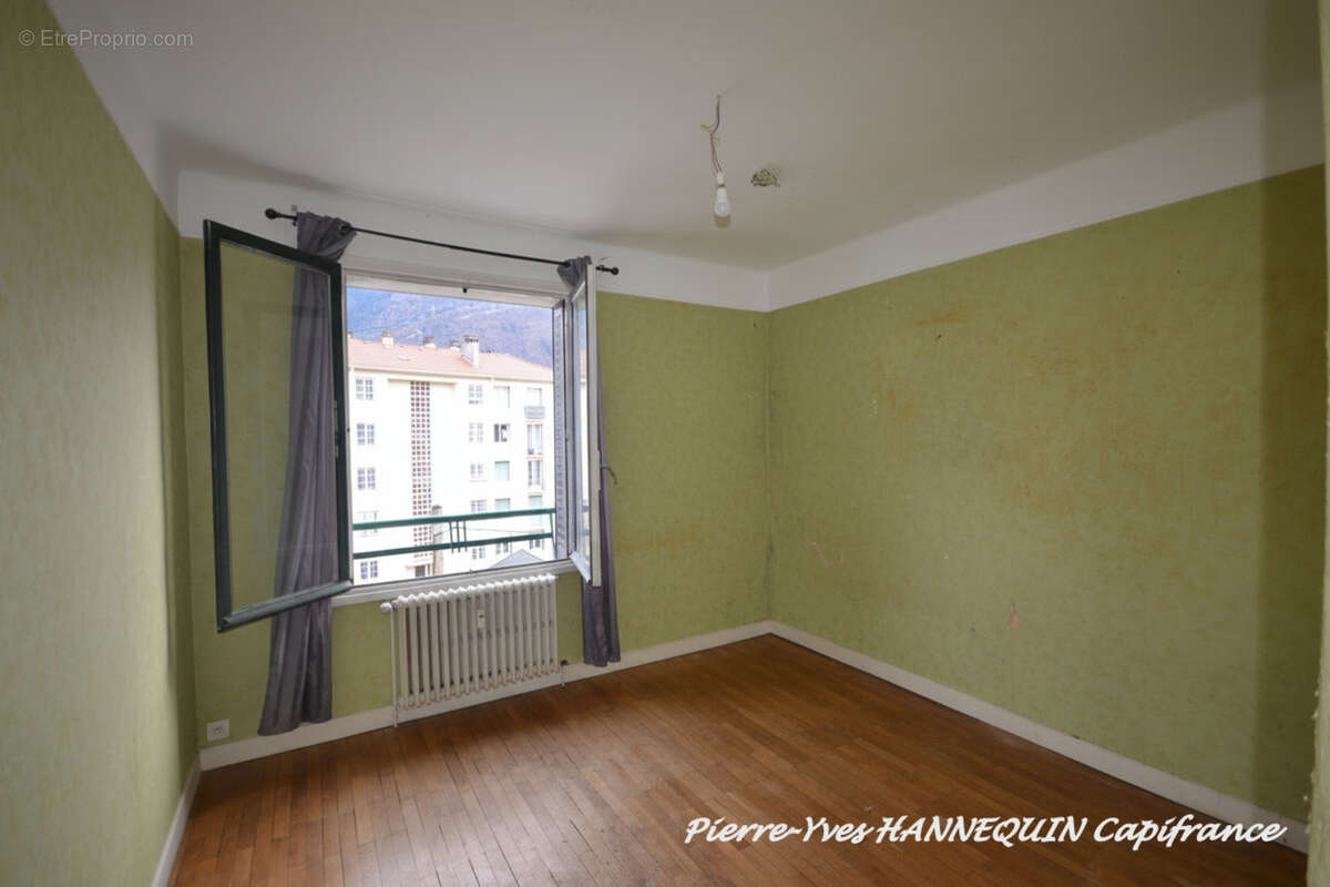 Appartement T4 de 96 m² avec beaux volumes – Quartier prisé proche centre-ville ALBERTVILLE (73) - photo 6