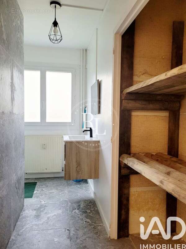 Photo 8 - Appartement à HEROUVILLE-SAINT-CLAIR