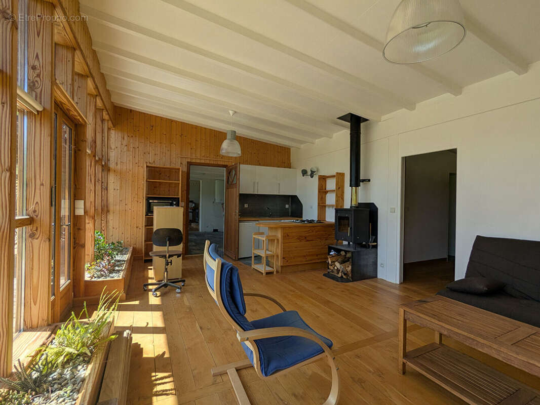 Maison en bois bioclimatique sur grand terrain - photo 3