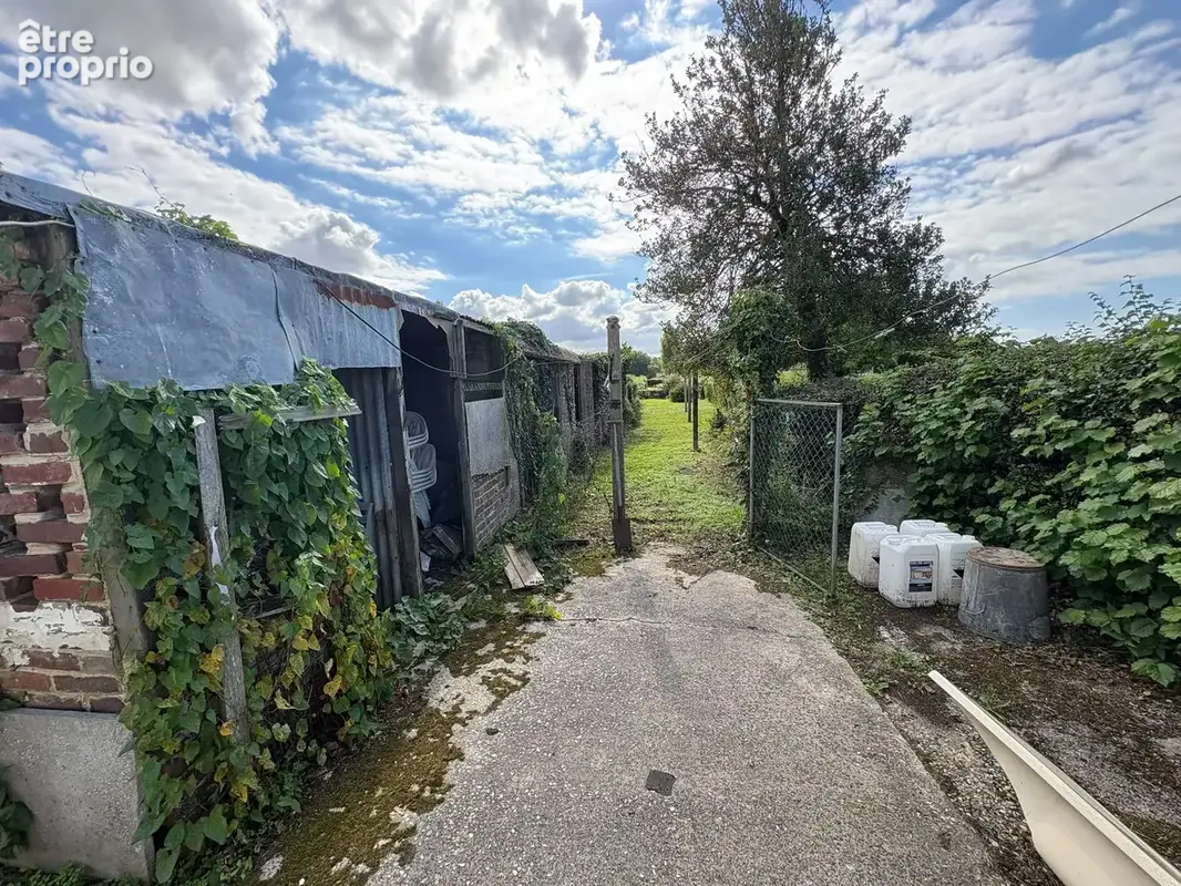 Ensemble immobilier de deux maisons à TULLY / 118500 euros - photo 22