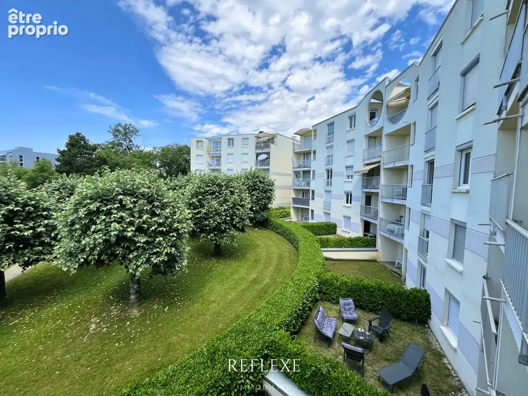 Appartement T4 rénové 80 m2 avec cave et garage - Résidence prisée Le Colysée - Besançon - photo 8