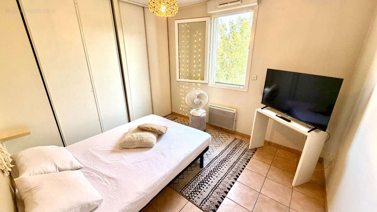 Appartement de type T2 avec terrasse et parking privatif fermé. - photo 8