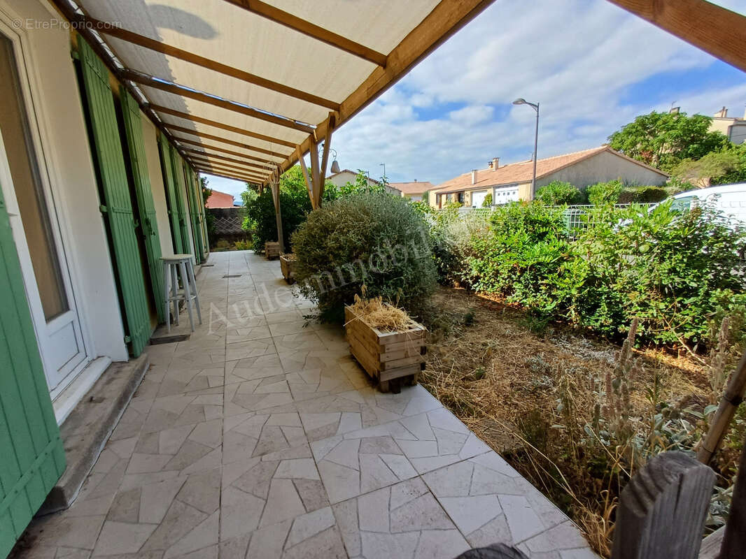 maison de plain-pied avec jardin et garage - photo 2