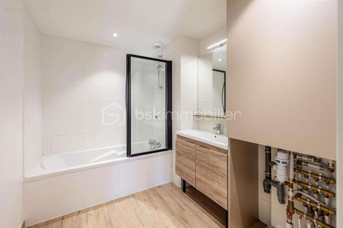 Magnifique T3 en rez-de-jardin / Place de parking / Cave / Garage en sus - photo 12