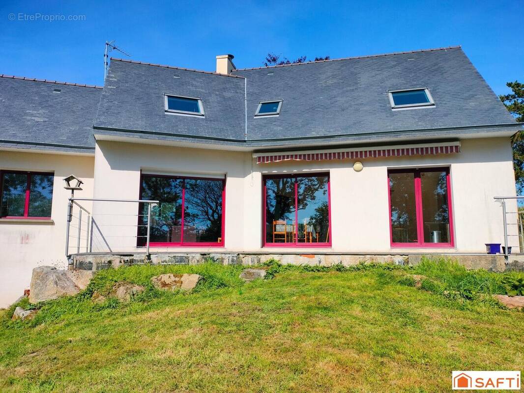Photo 1 - Maison à PLUGUFFAN