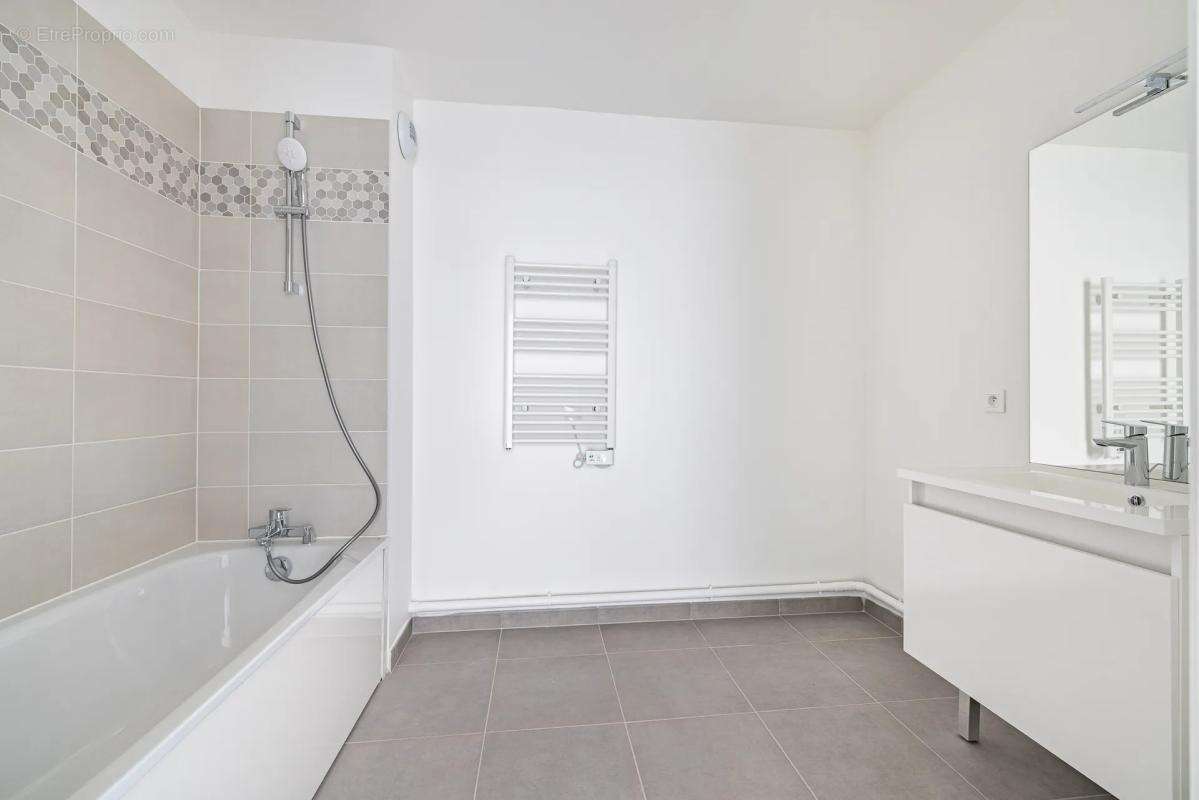 T3 73m² neuf – terrasse – double parking couvert - photo 6