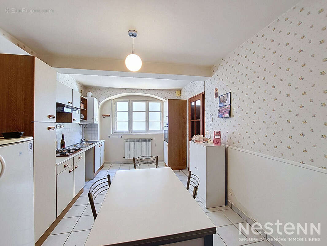 A Vendre Maison en pierre de 118m² avec quatre pièces et terrasse couverte à Condom - photo 7