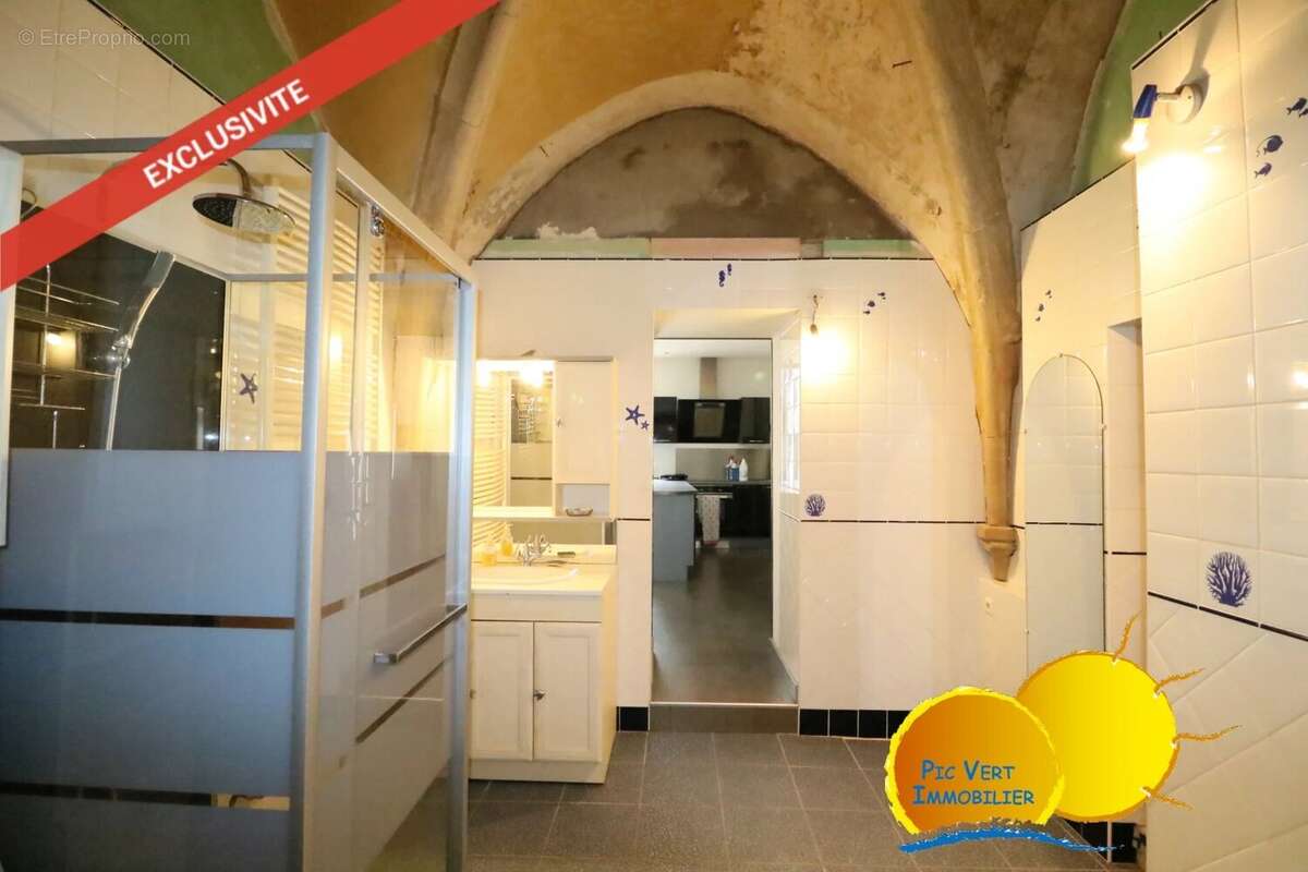 Ensemble immobilier de 2 grands appartements avec grenier, caves et cour - photo 3