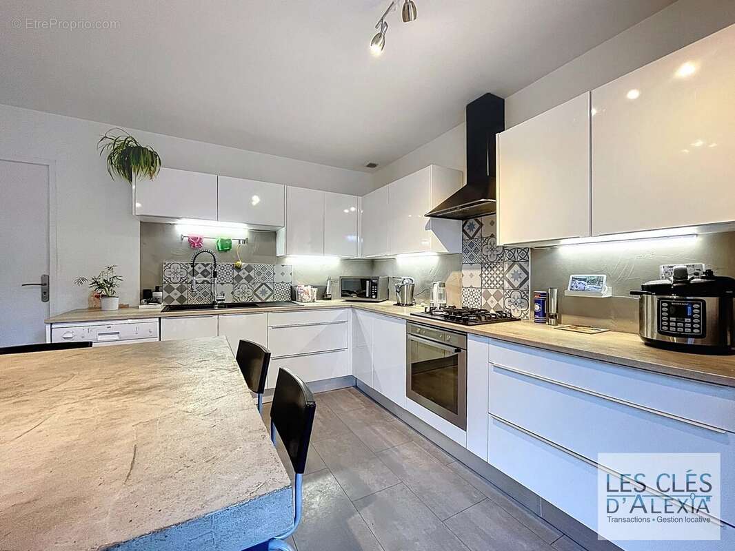 Maison à PONT-EVEQUE