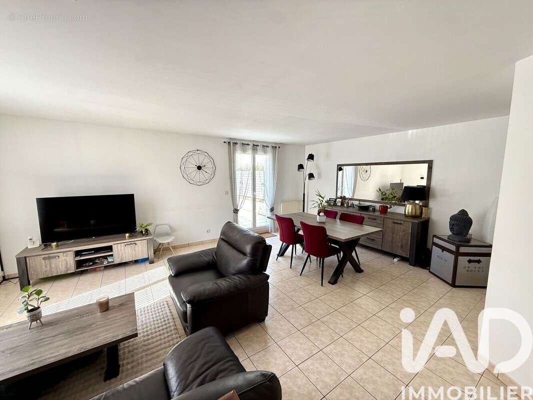 Photo 2 - Maison à BRIE-COMTE-ROBERT