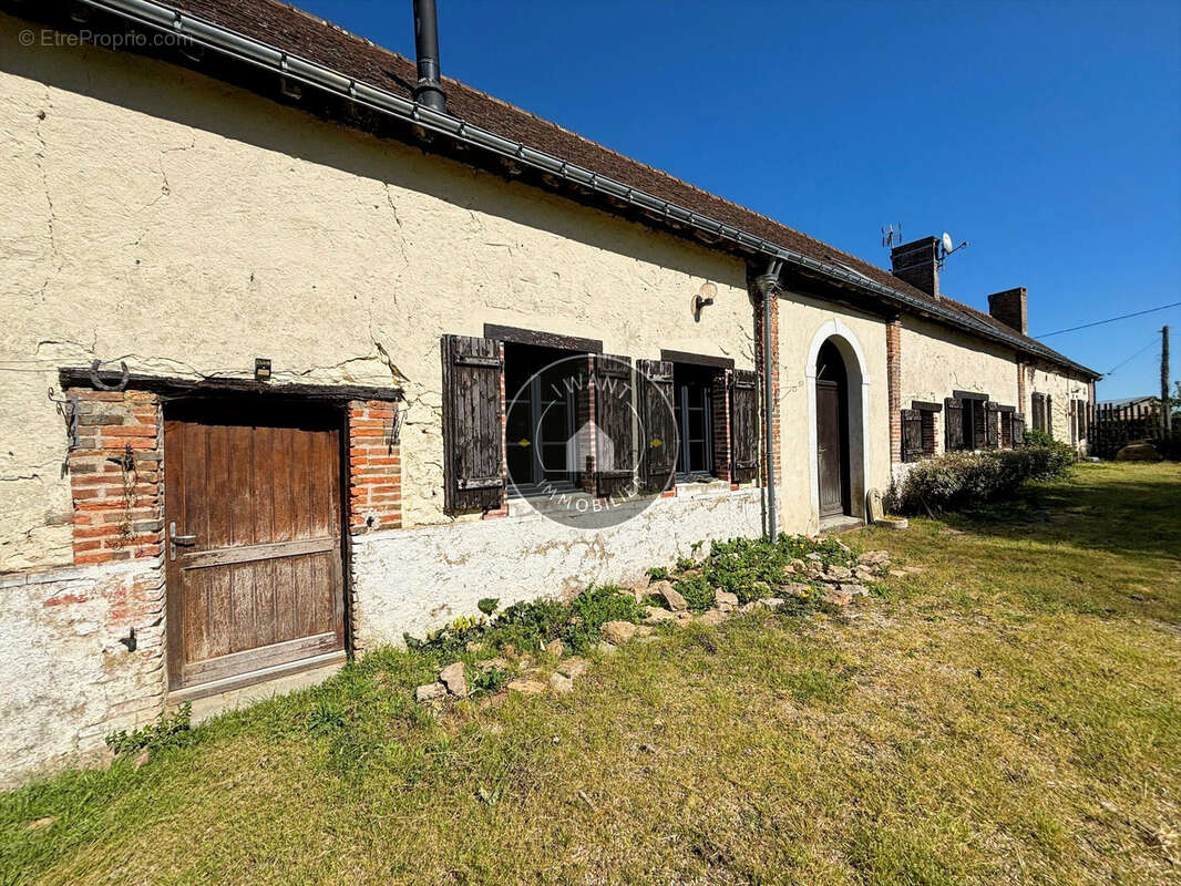 Maison à MOULIHERNE