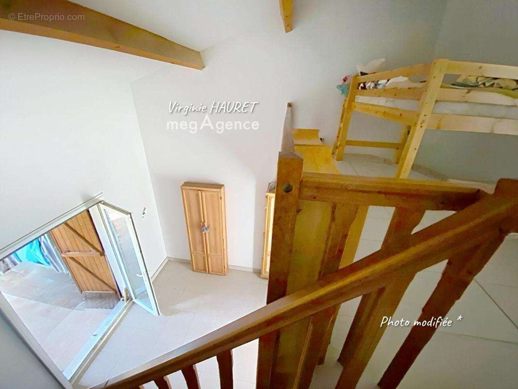 Pavillon 48m² - 1 chambre - 1 mezzanine - 1 veranda - 1 terrasse - 1 place de parking- jolie vue - photo 11