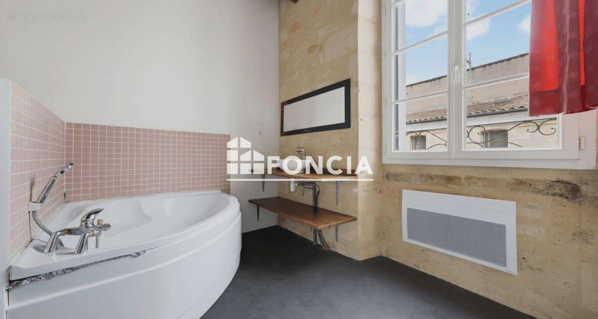 Appartement T2 Bis vendu libre avec charme de l'ancien - photo 3