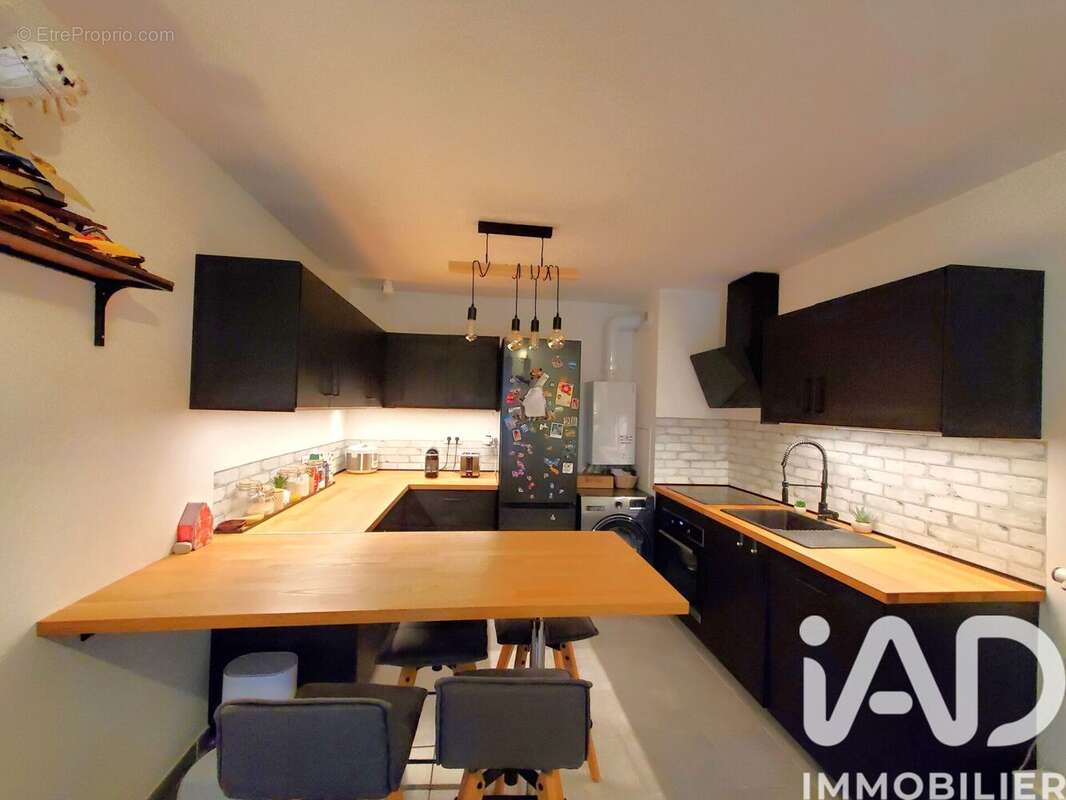 Photo 6 - Appartement à VOISINS-LE-BRETONNEUX