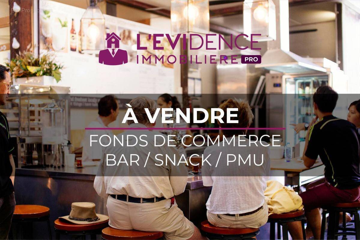 Photo 1 - Commerce à LIGNE