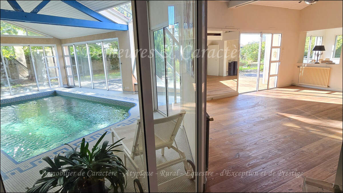 Maison, sauna, piscine intérieur, grands garages fermés - photo 2