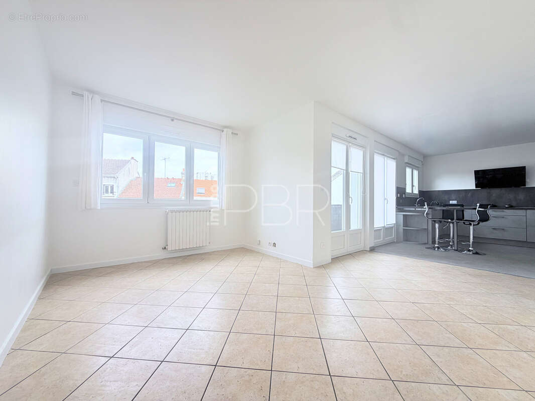 Appartement T3 avec cave - photo 2