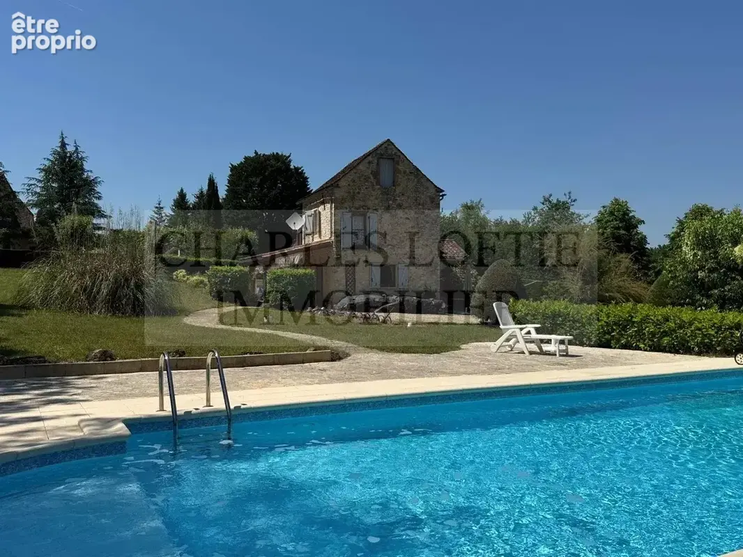 Charmante maison en pierre avec piscine, sur un terrain de 3800 m² , aux portes d’un village vivant de la Bouriane. - photo 2