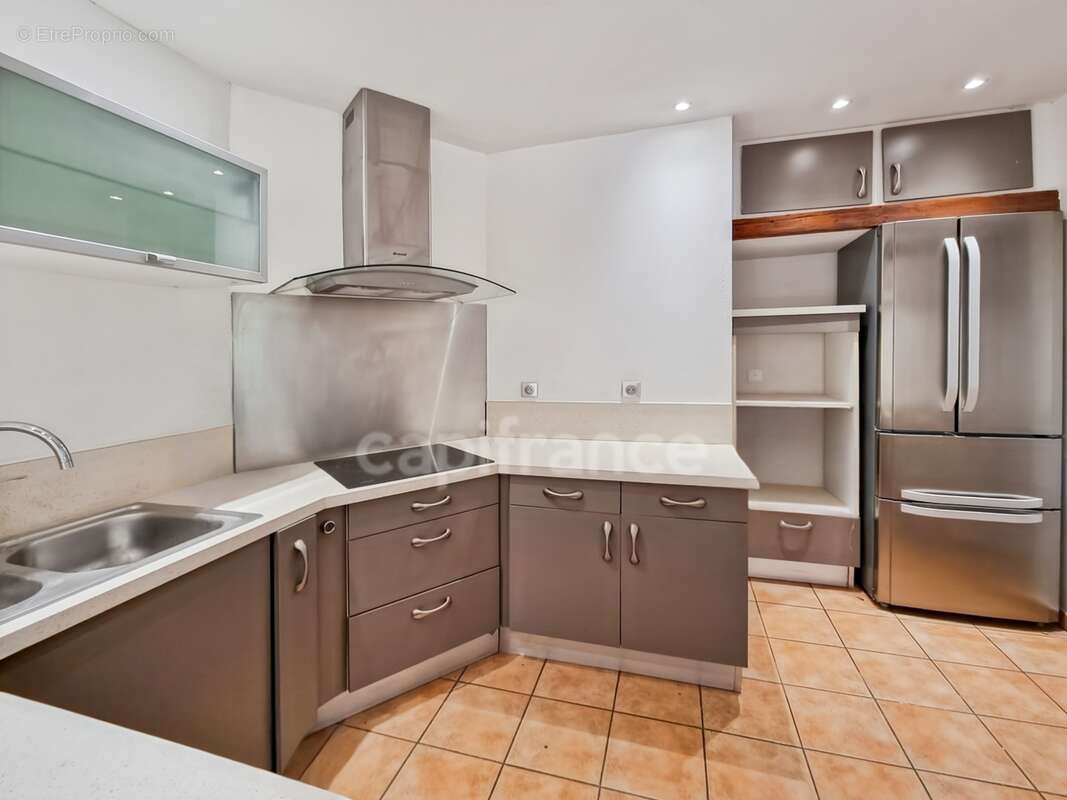 Villa de plain-pied de 156m² avec 6 pièces + une dépendance - Terrain arboré de 1400m² avec Piscine - (34160) - photo 13