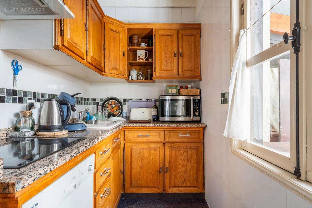 Maison de 5 pièces de 134 m² à Drancy - photo 9