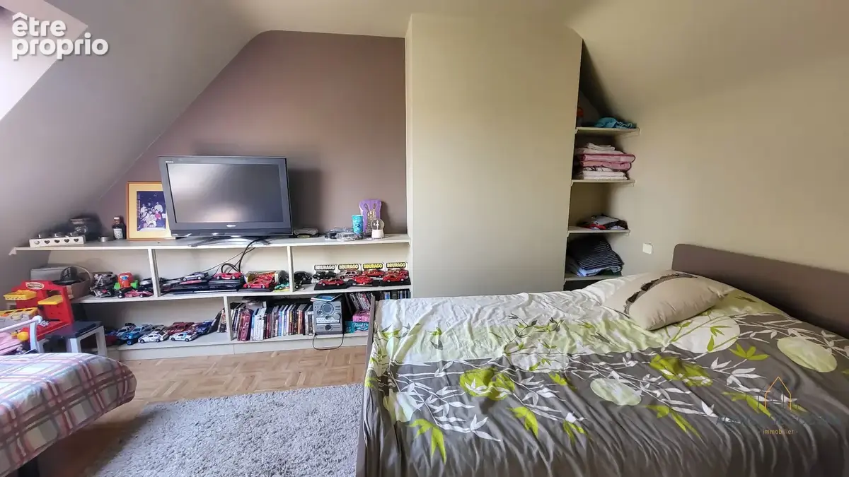 Maison familiale avec 3 chambres et terrain arboré à La Grande Prairie - photo 12
