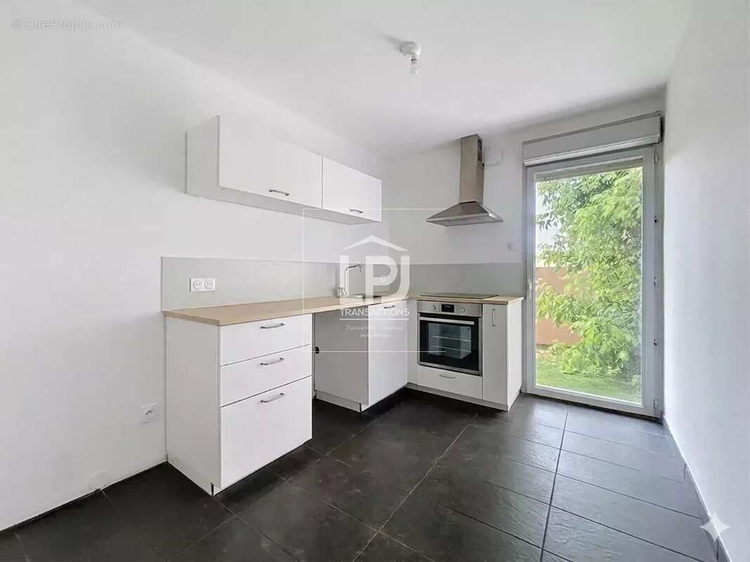 Appartement t4 avec jardin de plus de 300 m² et stationnements privés - photo 6