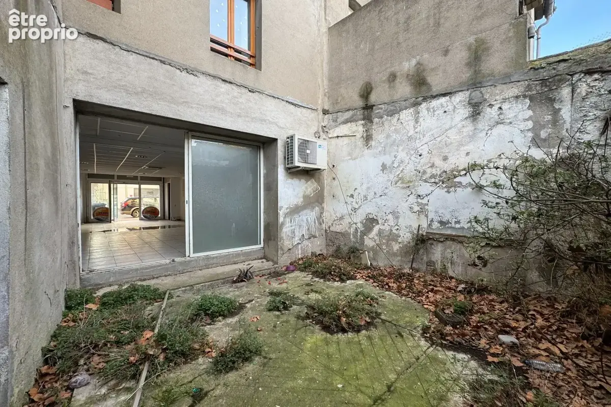 Bel immeuble en centre-ville ? 221,83 m2 Cet immeu - photo 13