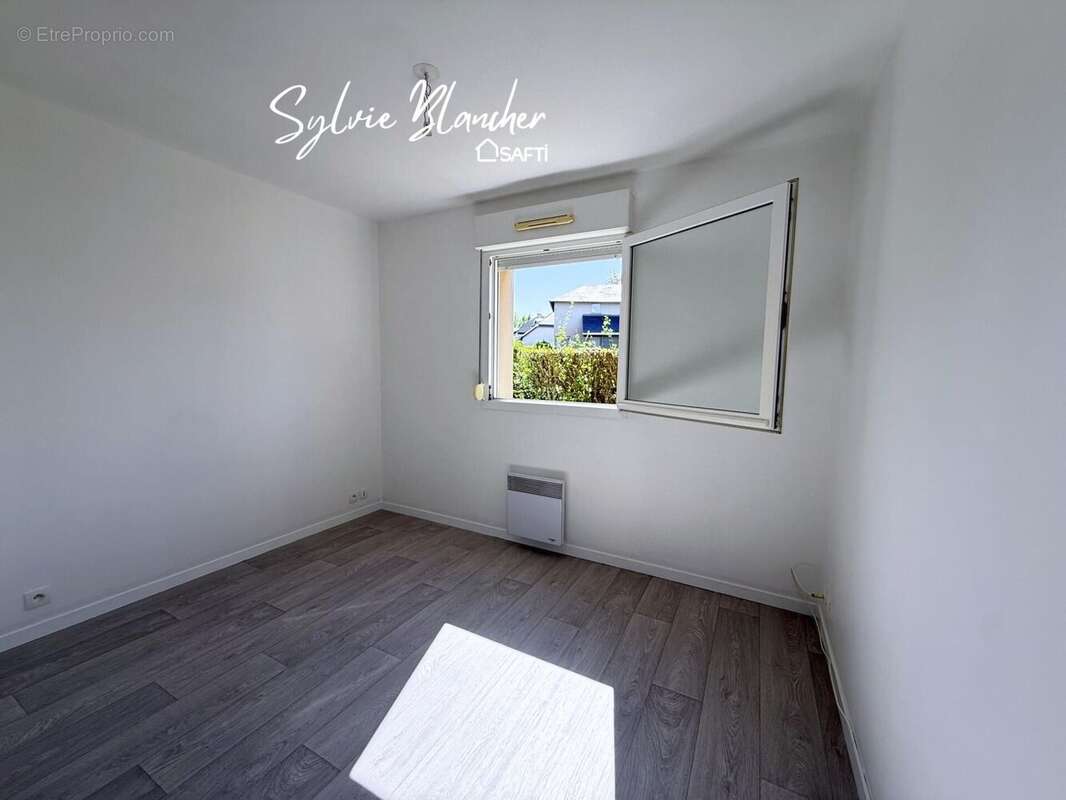Photo 8 - Appartement à HEROUVILLE-SAINT-CLAIR