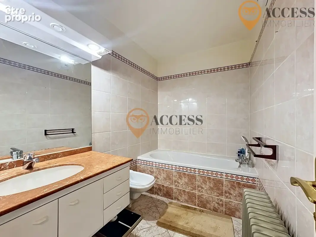 MARGENCY - Appartement avec cave, balcon et parking - photo 8