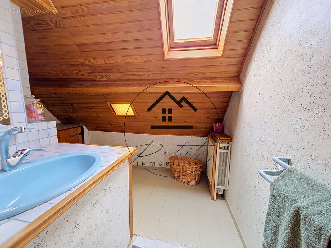 Maison familiale de 107 m2 avec 4 chambres et sous-sol total - photo 9