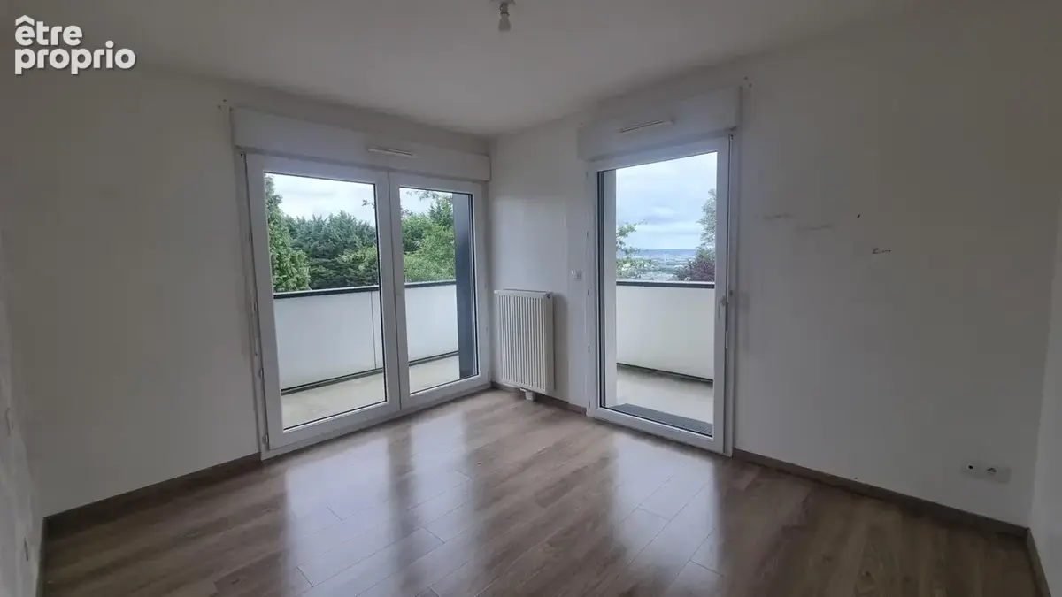 Appartement F3 à vendre - Maromme La Maine - 62 m² - Vue panoramique Rouen - 2 balcons - Parking - photo 9