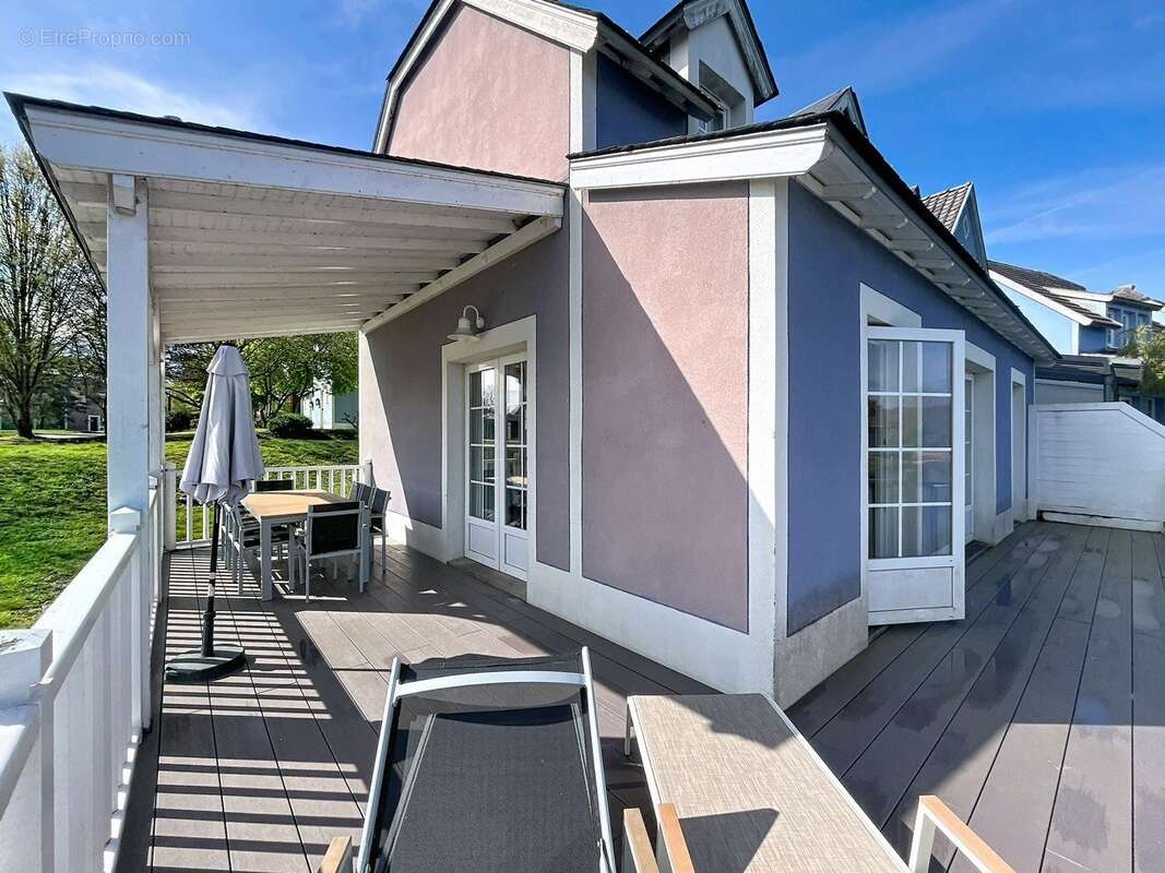 INVESTISSEMENT LOCATIF  CHAMOUILLE  Résidence de tourisme Center Parcs Le Lac d'Ailette - 7 % de rentabilité - photo 2