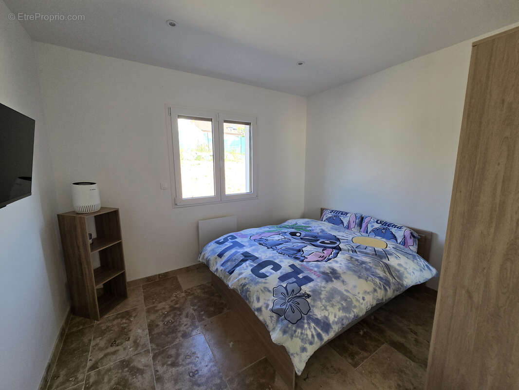 Maison 126 m² à Saint-Remy-En-Rollat  - photo 8
