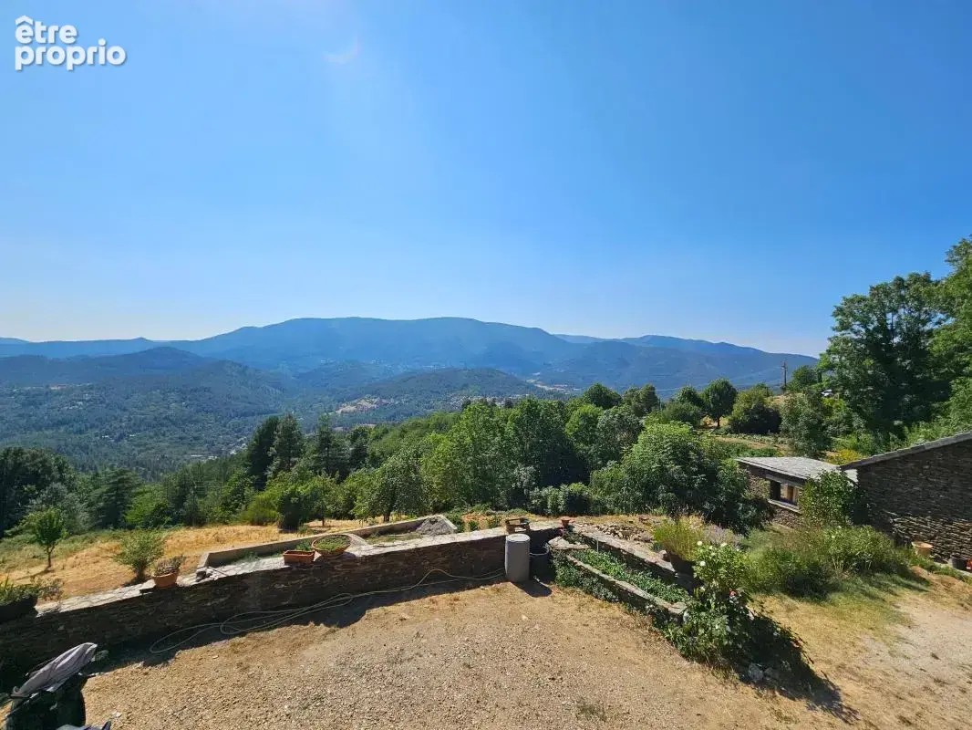 PONTEILS-ET-BRÉSIS- Mas en pierre 119m2, source privée, vue panoramique et 8000m2 de terrain. Annexe à rénover - photo 3