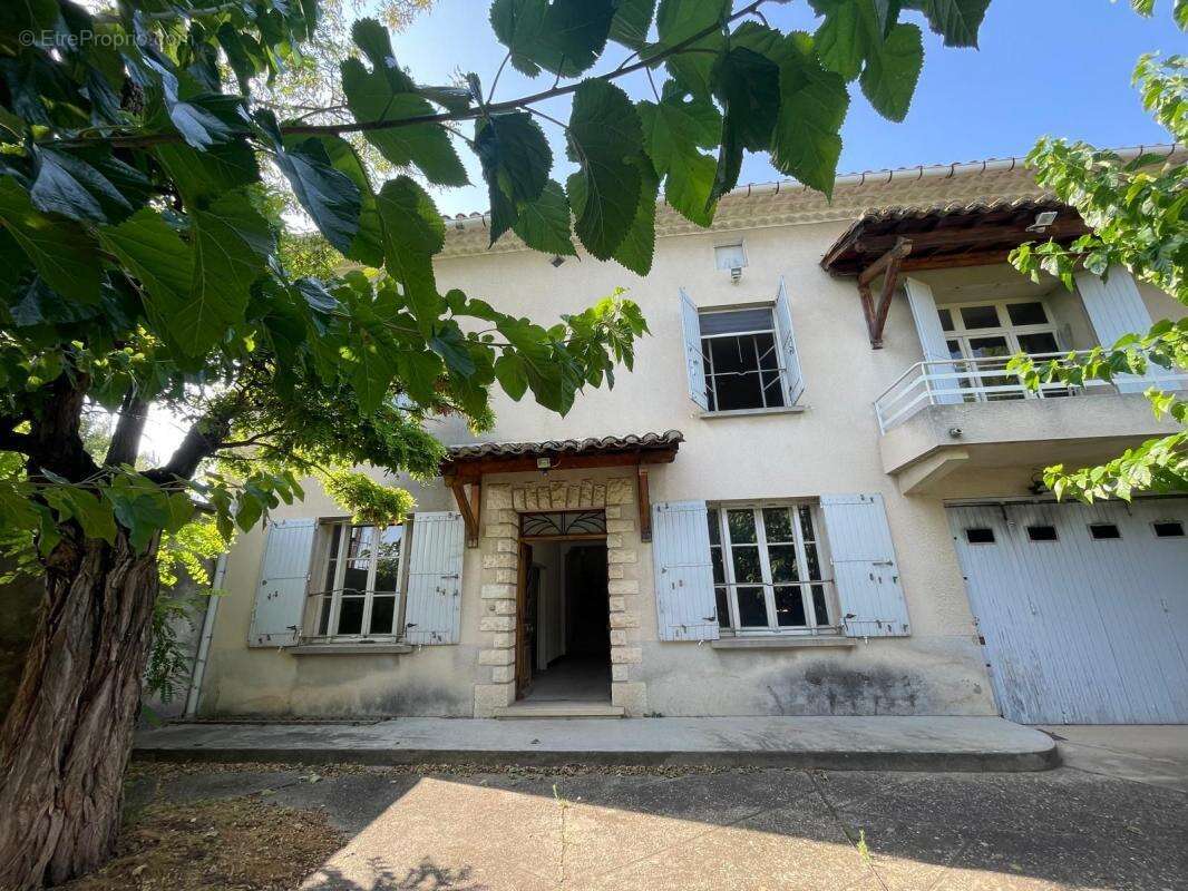 Maison à LAUDUN-L'ARDOISE