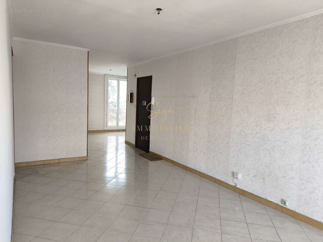 Appartement t3/4 65 m2 avec balcons et cave 13010 150 000 € - photo 5
