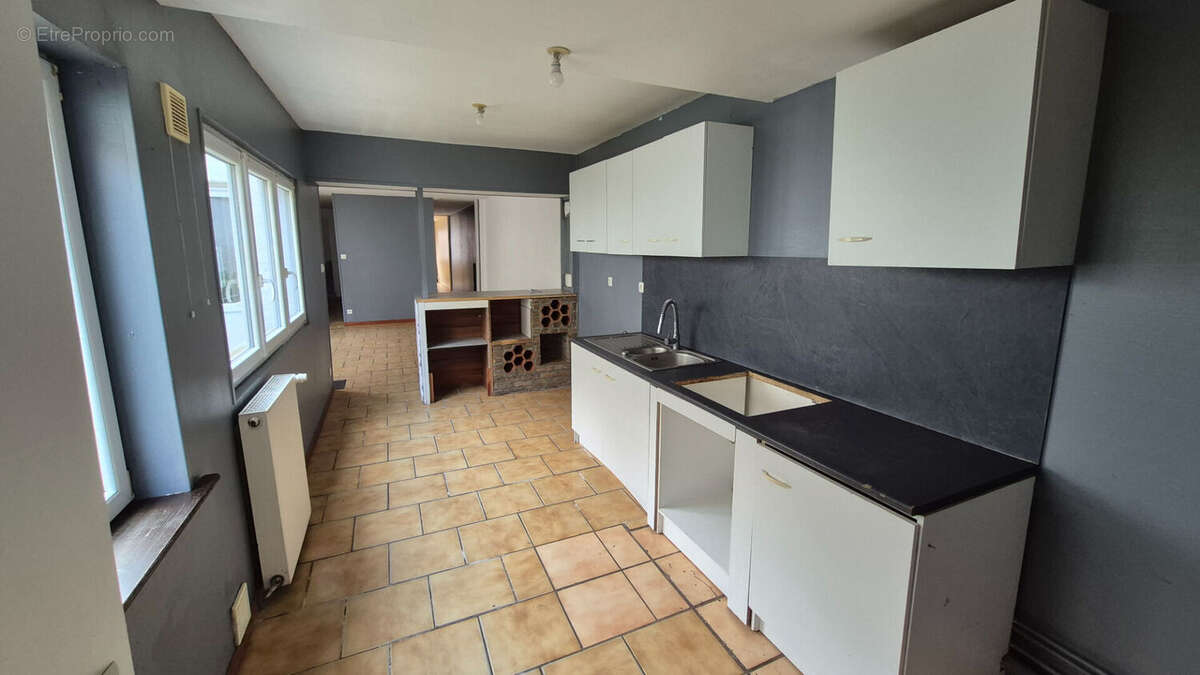 Maison à QUIEVRECHAIN