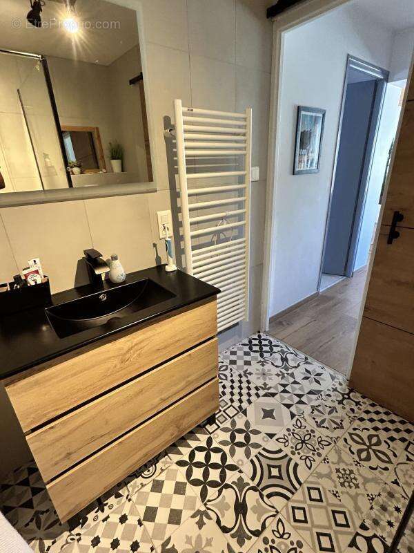 Maison de 101m² - photo 10