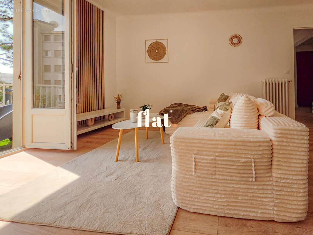 Appartement T3 de 70 m2  - RD POINT DE VANNES - 2 chambres + Cave - photo 4