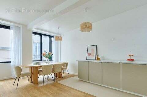 Appartement 98 m² à Paris-9e  - photo 2