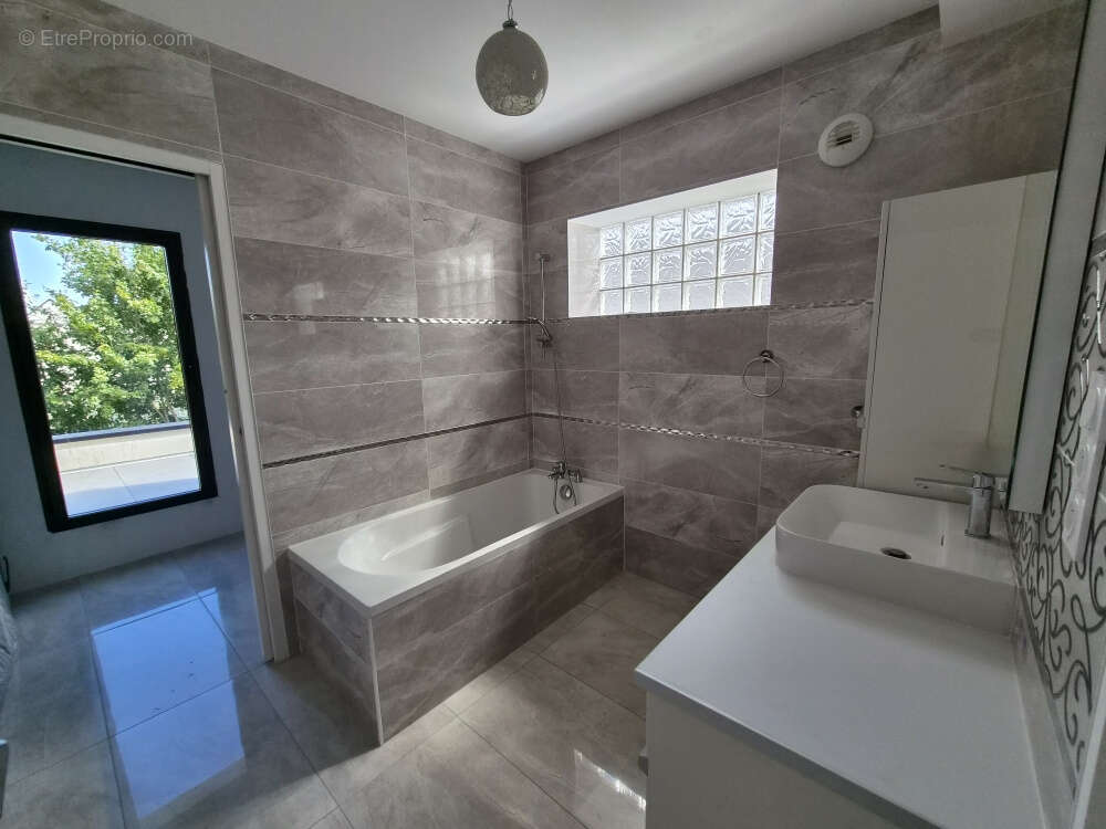 Maison moderne de 173 m2 habitables - photo 13