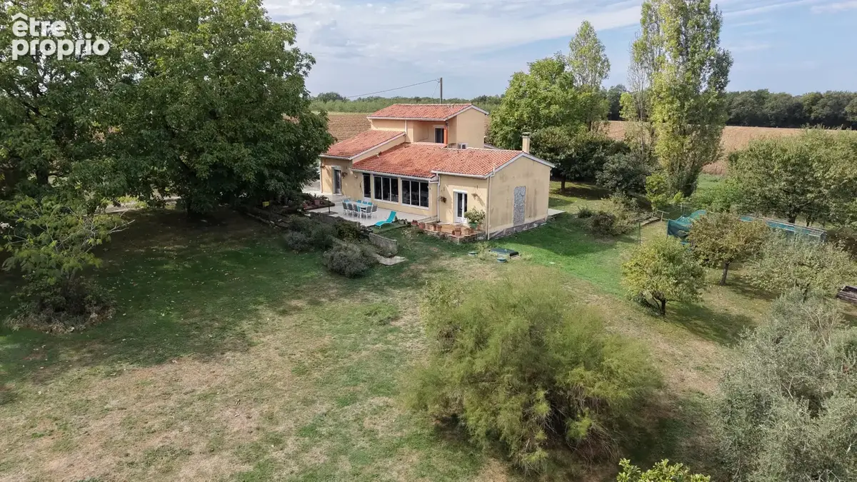 Maison familiale sur 1 hectare de terrain arboré - photo 3