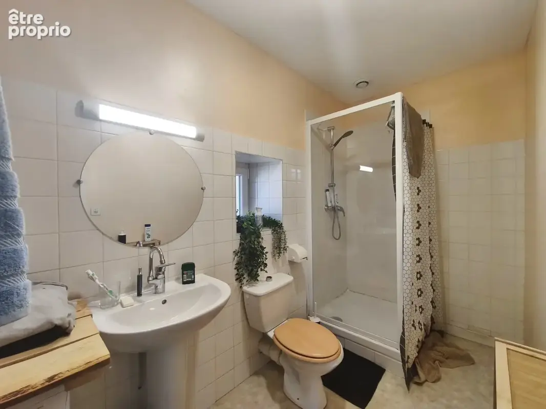 immeuble avec 2 appartements avec garage et terrain - photo 16