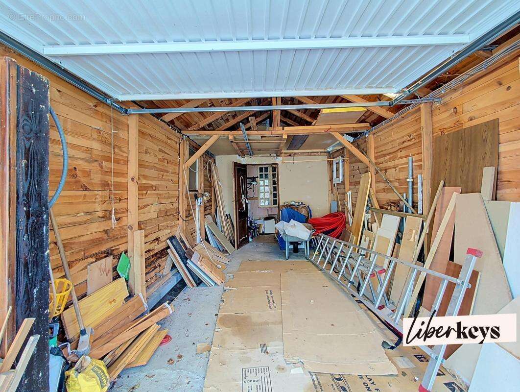 Maison de campagne située à BOURTH, 3 chambres, nombreux garages et remises sur terrain de 1024m2 clos et paysagé - photo 19
