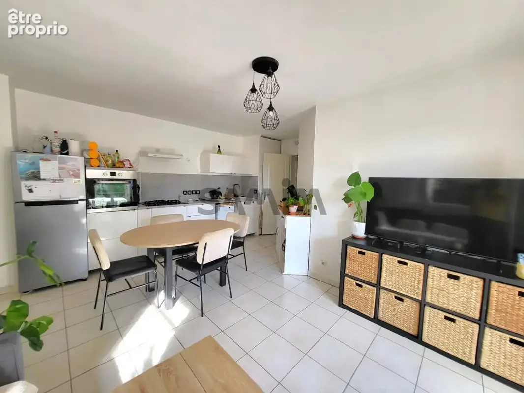 A vendre -  appartement de plain pied avec jardin et 2 place - photo 4