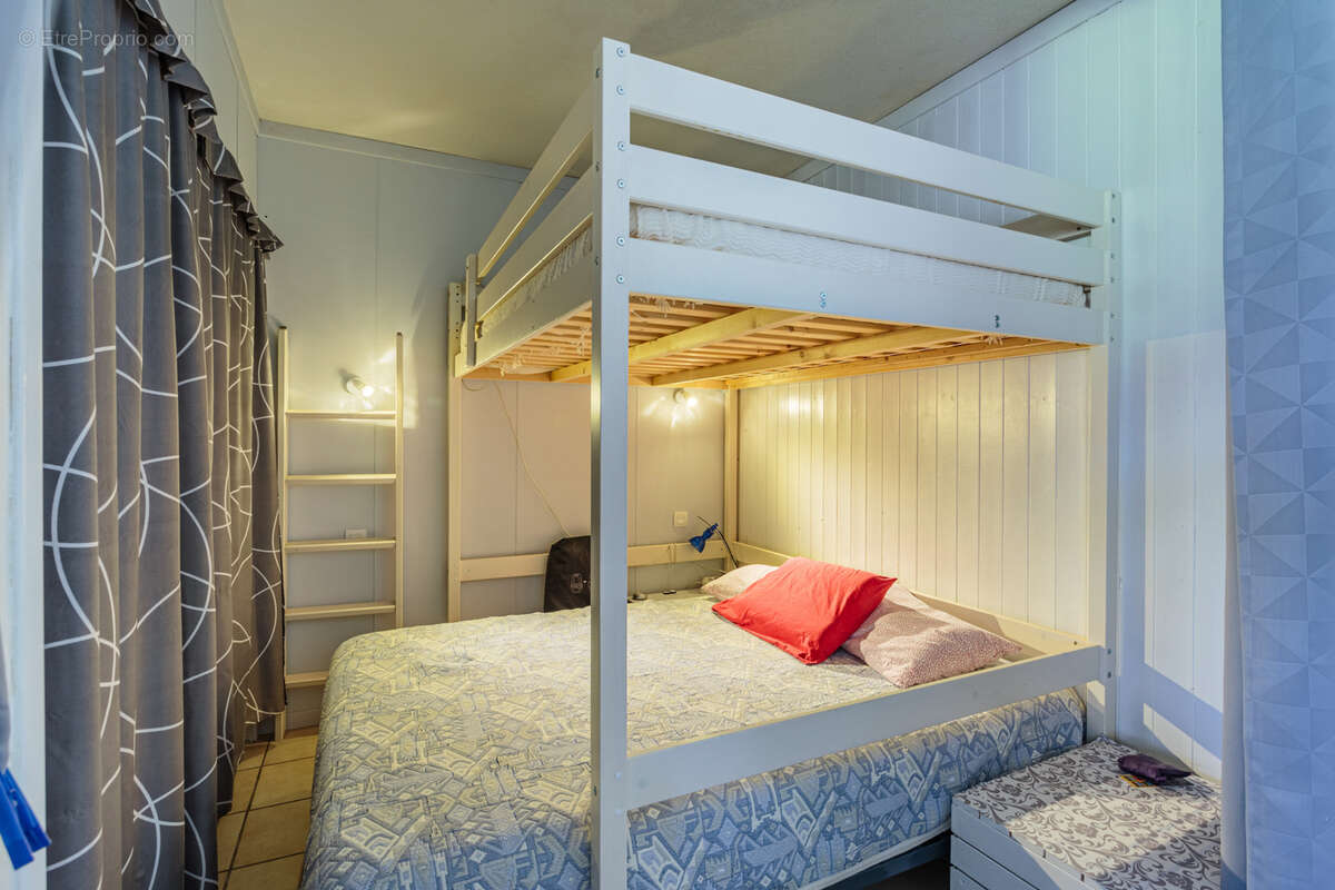 Appartement T2 bis rez-de-chaussée 52m2 + cave privative de 7m2 - photo 6