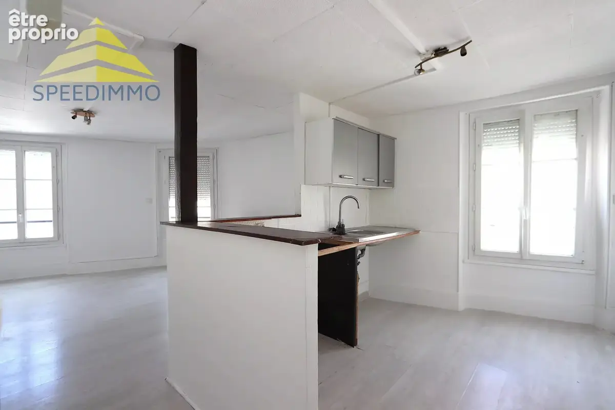 Immeuble de rapport – commerce + 3 appartements - photo 10