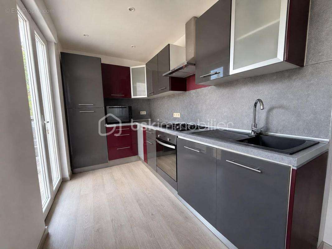 Maison familiale de 107 m² avec garage, jardin et dépendances à Saint-Quentin - photo 4
